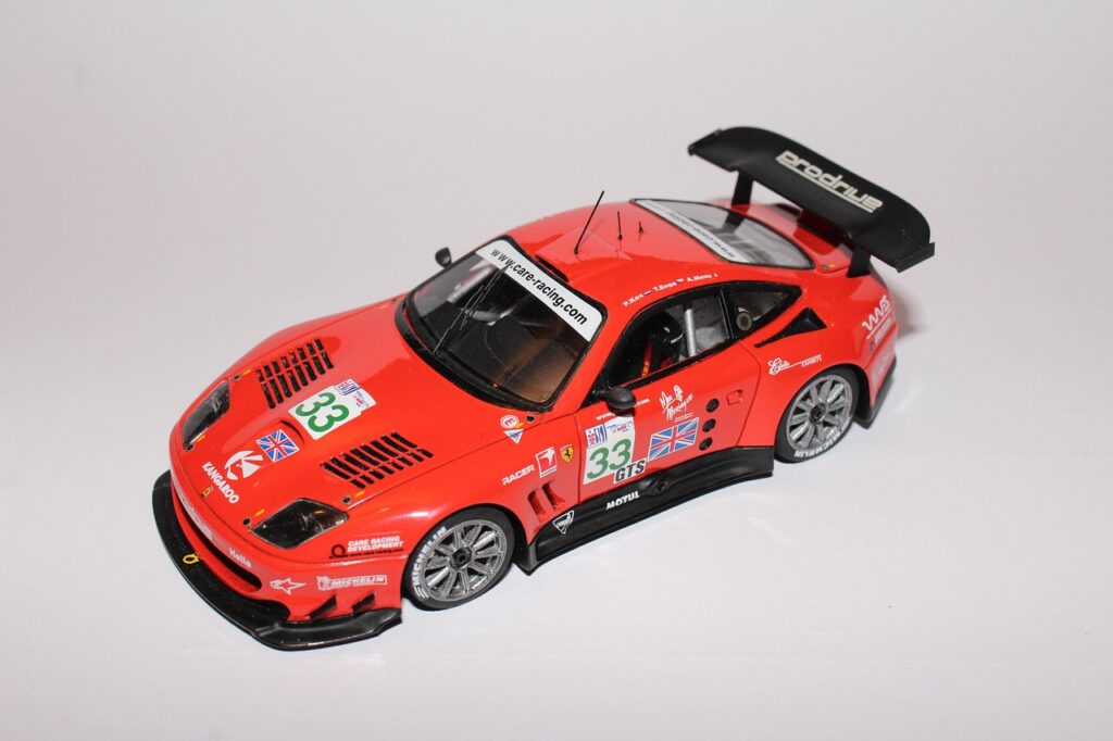 Miniature scale model ferrari red color car for sale.